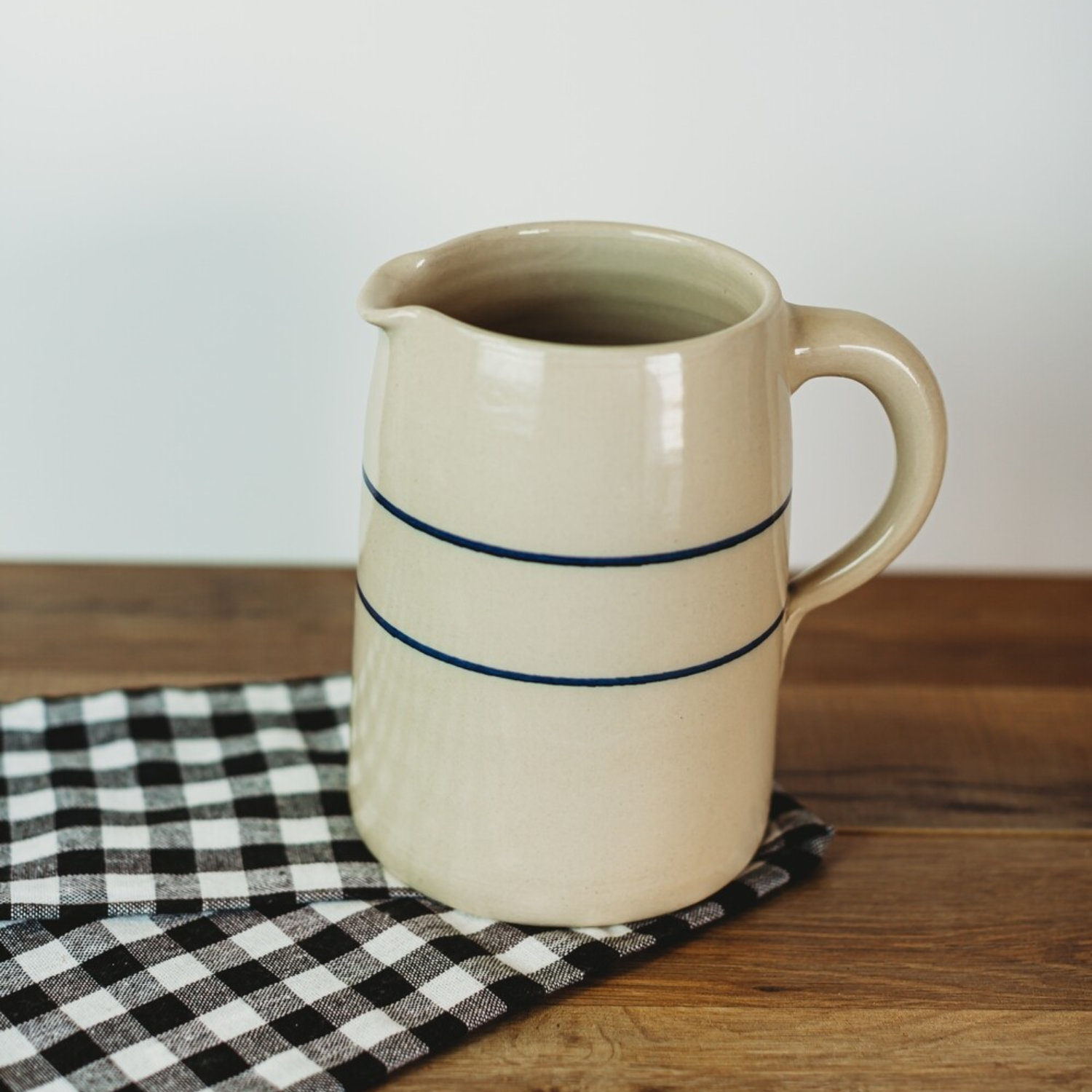 1 gallon stoneware jug / pitcher with blue stripe handmade in the USA by Martinez pottery - classic country styling and made to last a lifetime